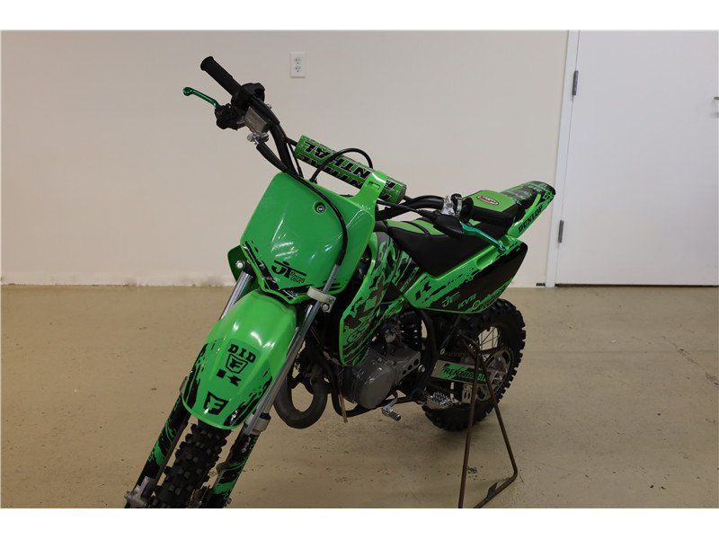 2021 Kawasaki KX 65 in a Green exterior color. New England Powersports 978 338-8990 pixelmotiondemo.com 