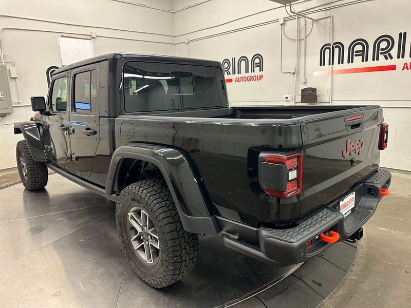 2024 Jeep Gladiator Mojave X 4x4 in a Black Clear Coat exterior color. Marina Chrysler Dodge Jeep RAM (855) 616-8084 marinadodgeny.com 