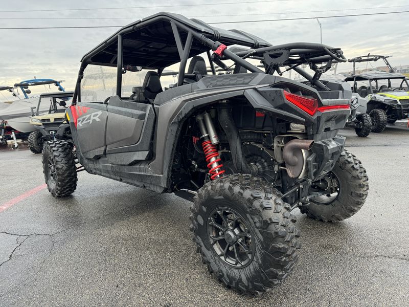 2024 POLARIS RZR XP 4 1000 ULTIMATE in a RED exterior color. Family PowerSports (877) 886-1997 familypowersports.com 