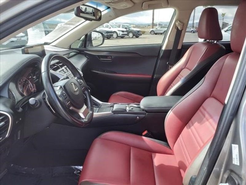 2019 Lexus NX 300 Base in a Atomic Silver exterior color and Rioja Redinterior. Perris Valley Kia 951-657-6100 perrisvalleykia.com 