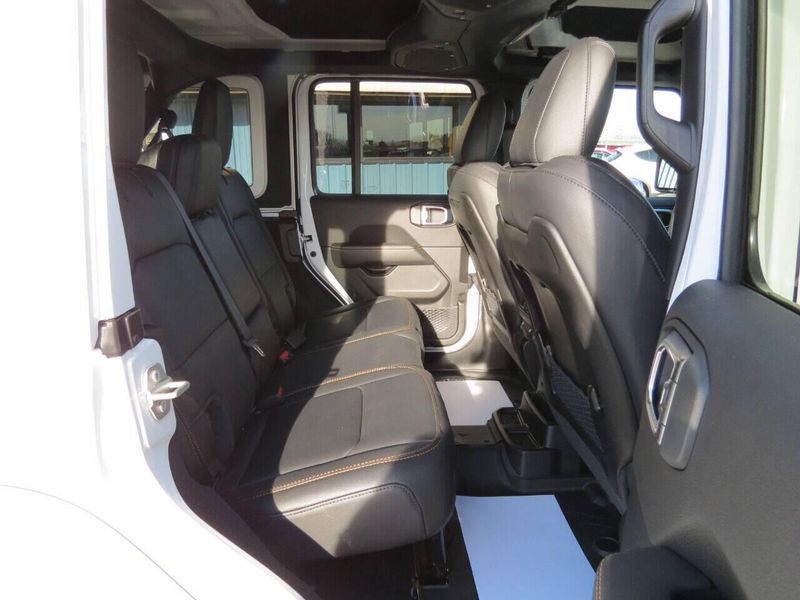 2024 Jeep Wrangler 4-door Sahara in a Bright White Clear Coat exterior color and Blackinterior. Militello Motors ​507-200-4344 militellomotors.net 