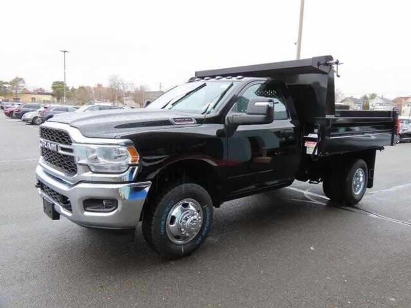 2023 RAM 3500 Chassis Cab Tradesman in a Diamond Black Crystal Pearl Coat exterior color and Diesel Gray/Blackinterior. Papas Jeep Ram In New Britain, CT 860-356-0523 papasjeepram.com 