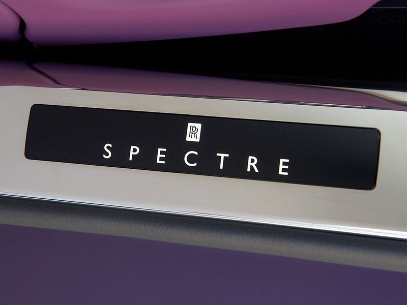 2024 Rolls-Royce Spectre  in a Twilight Purple exterior color and Arctic Whiteinterior. SHELLY AUTOMOTIVE shellyautomotive.com 