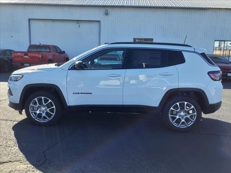 2024 Jeep Compass Latitude Lux in a Bright White Clear Coat exterior color and Blackinterior. Perris Valley Auto Center 951-657-6100 perrisvalleyautocenter.com 