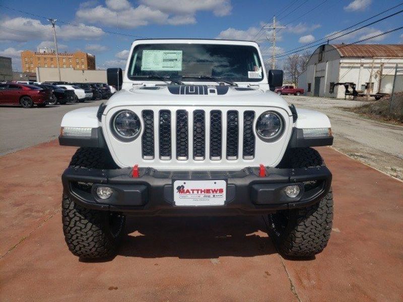 2023 Jeep Gladiator Rubicon 4x4 in a Bright White Clear Coat exterior color and Blackinterior. Matthews Chrysler Dodge Jeep Ram 918-276-8729 cyclespecialties.com 