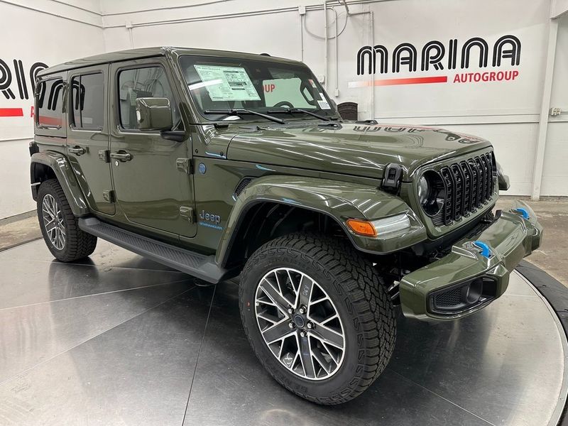 2024 Jeep Wrangler 4-door High Altitude 4xe in a Sarge Green Clear Coat exterior color and Green/Blackinterior. Marina Auto Group (855) 564-8688 marinaautogroup.com 