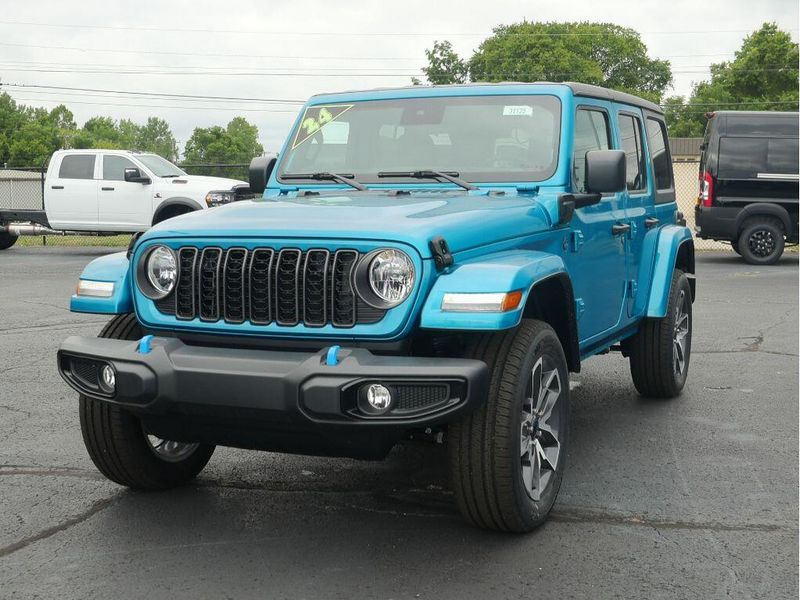 2024 Jeep Wrangler 4-door Sport S 4xe in a Bikini Pearl Coat exterior color and Blackinterior. Paul Sherry Chrysler Dodge Jeep RAM (937) 749-7061 sherrychrysler.net 