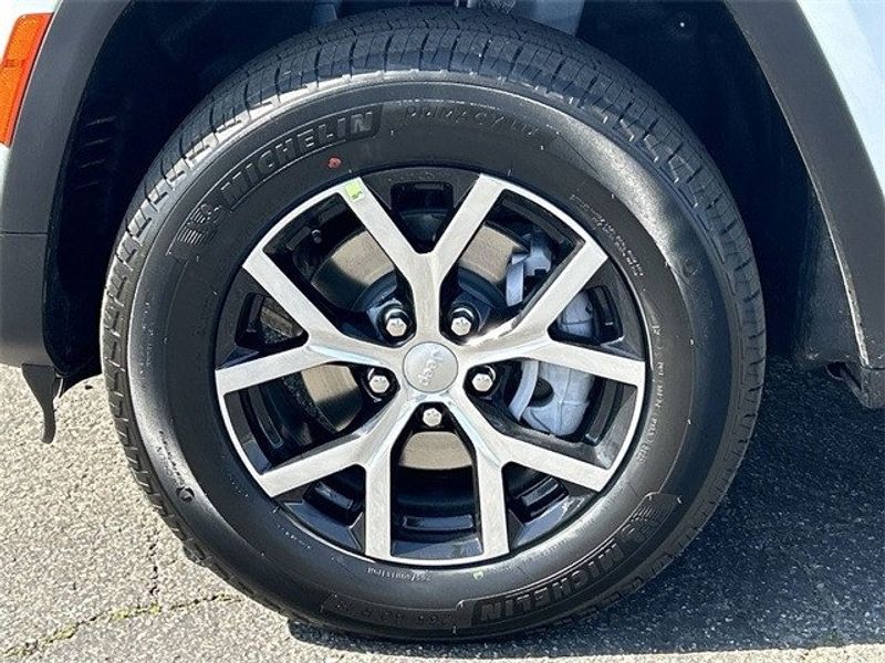 2024 Jeep Grand Cherokee Limited 4x4 in a Bright White Clear Coat exterior color. McPeek