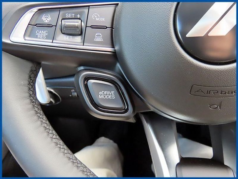 2024 Dodge Hornet R/T Plus in a Blue Steele exterior color and Blackinterior. Papas Jeep Ram In New Britain, CT 860-356-0523 papasjeepram.com 