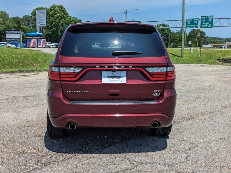 2021 Dodge Durango GT Plus in a Octane Red Pearl Coat exterior color and Blackinterior. Johnson Dodge 601-693-6343 pixelmotiondemo.com 