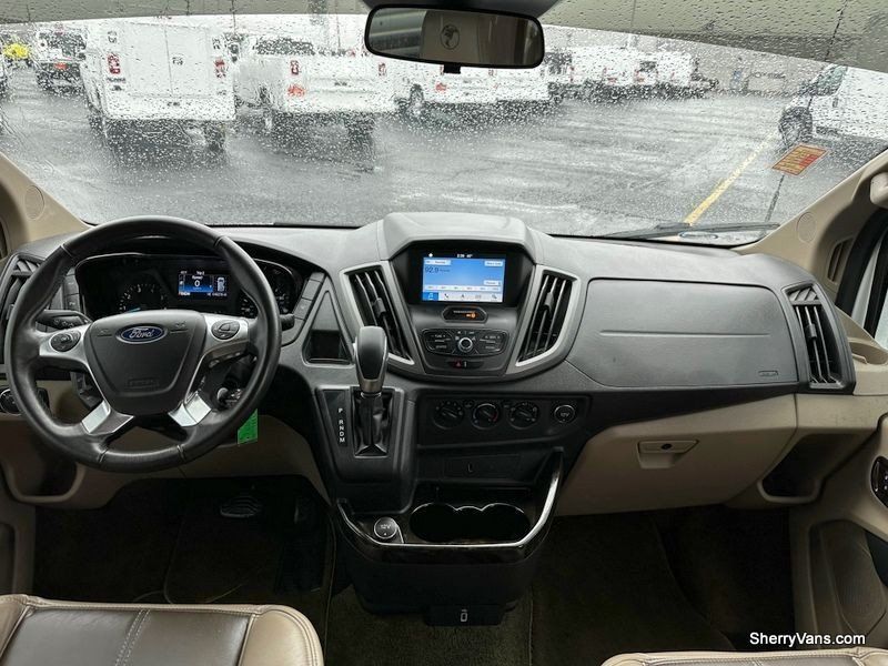 2019 Ford Transit-150  in a Oxford White exterior color and Taupe/Browninterior. Paul Sherry Chrysler Dodge Jeep RAM (937) 749-7061 sherrychrysler.net 