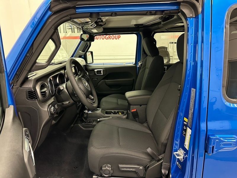 2023 Jeep Gladiator Sport S 4x4 in a Hydro Blue Pearl Coat exterior color and Blackinterior. Marina Chrysler Dodge Jeep RAM (855) 616-8084 marinadodgeny.com 
