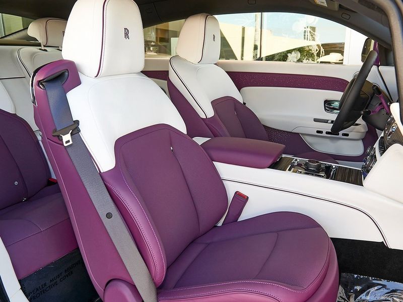 2024 Rolls-Royce Spectre  in a Twilight Purple exterior color and Arctic Whiteinterior. SHELLY AUTOMOTIVE shellyautomotive.com 