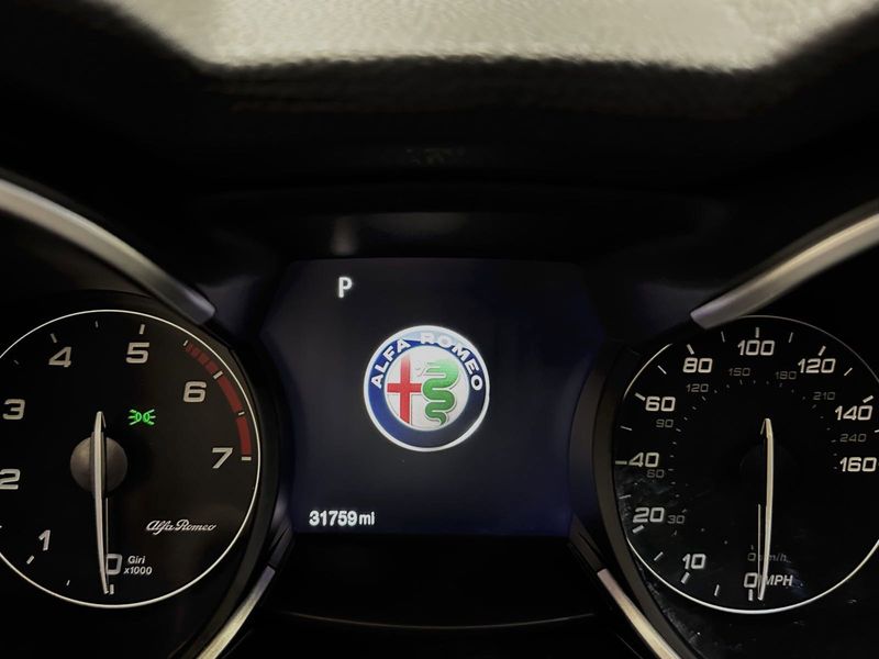 2021 Alfa Romeo Stelvio Sprint AWD w/Sunroof & Sound in a Vesuvio Gray Metallic exterior color and Black Heated Leatherinterior. Schmelz Countryside SAAB (888) 558-1064 stpaulsaab.com 