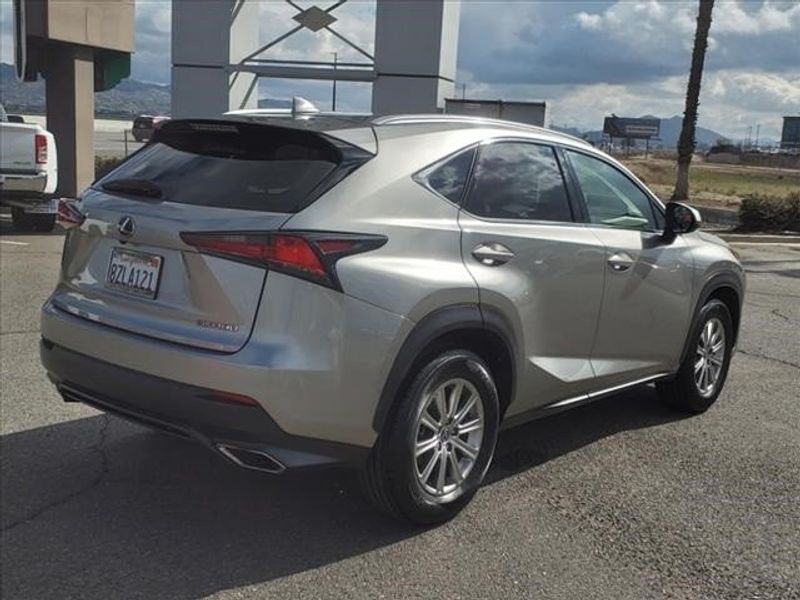2019 Lexus NX 300 Base in a Atomic Silver exterior color and Rioja Redinterior. Perris Valley Chrysler Dodge Jeep Ram 951-355-1970 perrisvalleydodgejeepchrysler.com 