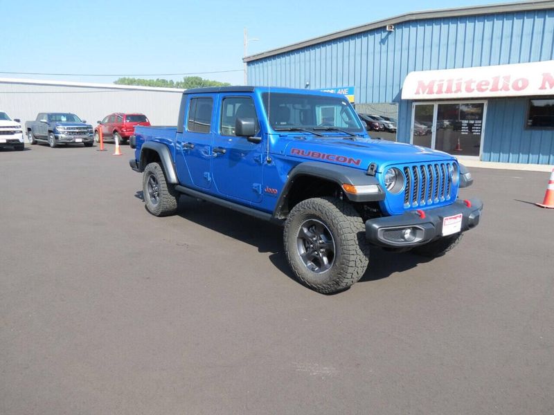 2021 Jeep Gladiator Rubicon 4x4 4dr Crew Cab 5.0 ft. SB in a Blue exterior color and Blackinterior. Militello Motors ​507-200-4344 militellomotors.net 