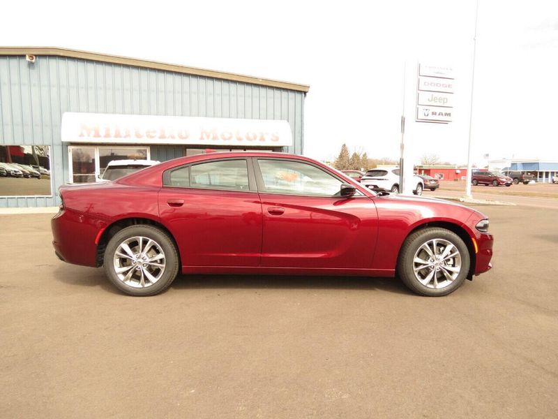 2023 Dodge Charger SXT Awd in a Octane Red exterior color and Blackinterior. Militello Motors ​507-200-4344 militellomotors.net 