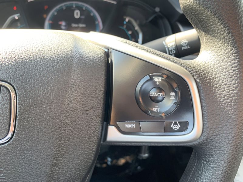 2020 Honda Civic Sedan LX in a White exterior color. BEACH BLVD OF CARS beachblvdofcars.com 