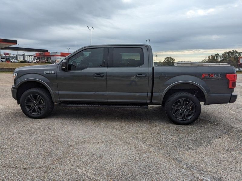 2020 Ford F-150 Lariat in a Magnetic Metallic exterior color and Blackinterior. Johnson Dodge 601-693-6343 pixelmotiondemo.com 