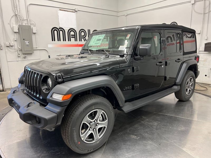 2023 Jeep Wrangler 4-door Sport S 4x4 in a Black Clear Coat exterior color and Blackinterior. Marina Chrysler Dodge Jeep RAM (855) 616-8084 marinadodgeny.com 