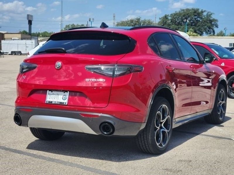 2024 Alfa Romeo Stelvio Ti in a Alfa Rosso exterior color and Blackinterior. Northside Imports Houston 281-475-4549 northsideimportshouston.com 