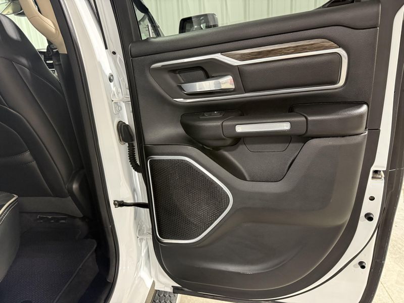 Used 2020 RAM 1500 Laramie in a Bright White Clear Coat exterior color and Blackinterior. Thys Motor Company 319-318-6640 thysmotorco.com 