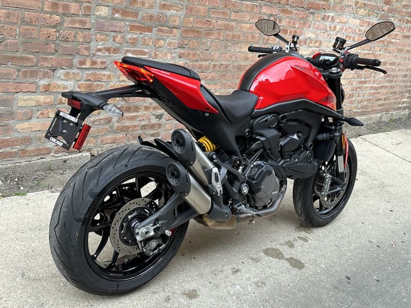2021 Ducati Monster Plus   in a red exterior color. Motoworks Chicago 312-738-4269 motoworkschicago.com 