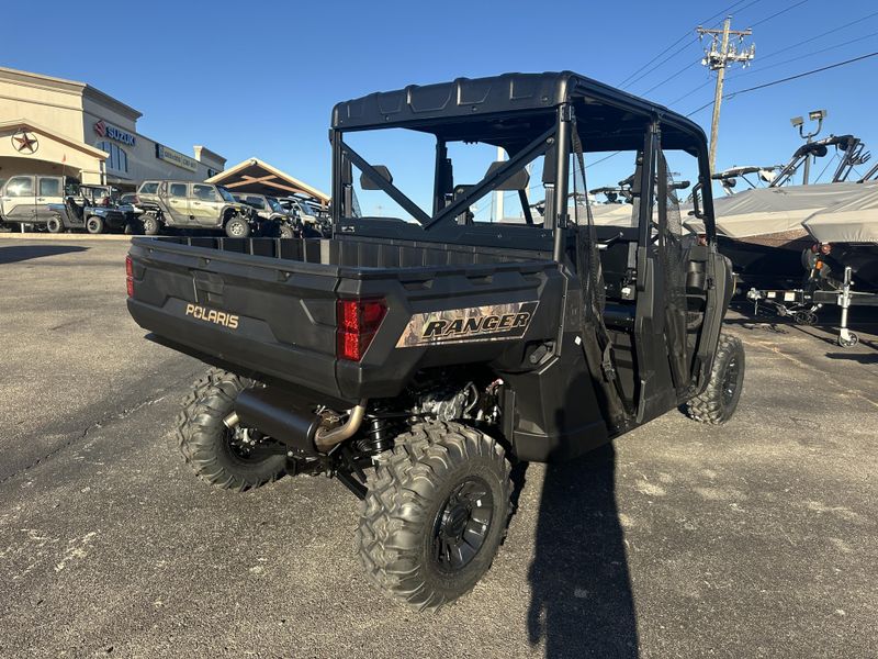 2025 POLARIS RANGER CREW 1000 PREMIUM PURSUIT CAMO in a POLARIS PURSUIT CAMO exterior color. Family PowerSports (877) 886-1997 familypowersports.com 