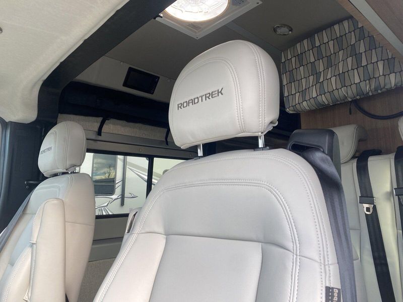 2024 ROADTREK Pivot  in a Silver Metallic exterior color and Chestnut Browninterior. Legacy Powersports 541-663-1111 legacypowersports.net 