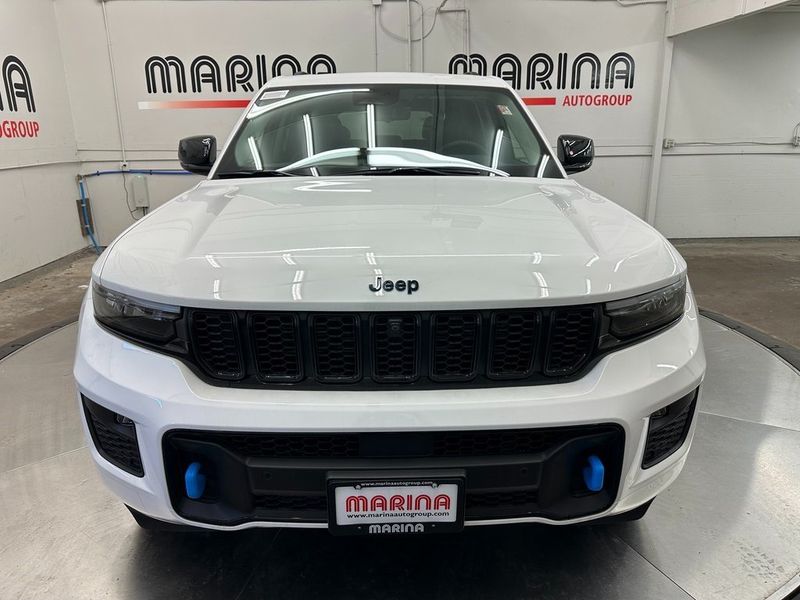 2024 Jeep Grand Cherokee Anniversary Edition 4xe in a Bright White Clear Coat exterior color and Global Blackinterior. Marina Auto Group (855) 564-8688 marinaautogroup.com 