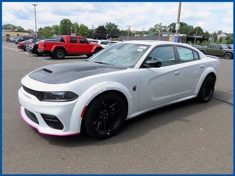 2023 Dodge Charger SRT Hellcat Widebody in a White Knuckle exterior color and Blackinterior. Papas Jeep Ram In New Britain, CT 860-356-0523 papasjeepram.com 