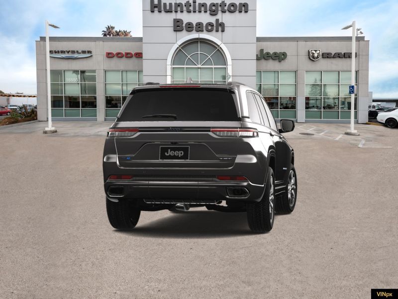 2023 Jeep Grand Cherokee 4xe Base 30th Anniversary 4x4 in a Baltic Gray exterior color and Global Blackinterior. BEACH BLVD OF CARS beachblvdofcars.com 