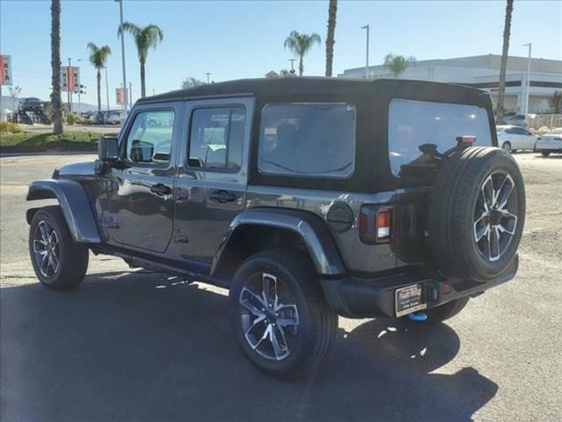 2024 Jeep Wrangler Sport S 4xe in a Granite Crystal Metallic Clear Coat exterior color and Blackinterior. Perris Valley Auto Center 951-657-6100 perrisvalleyautocenter.com 