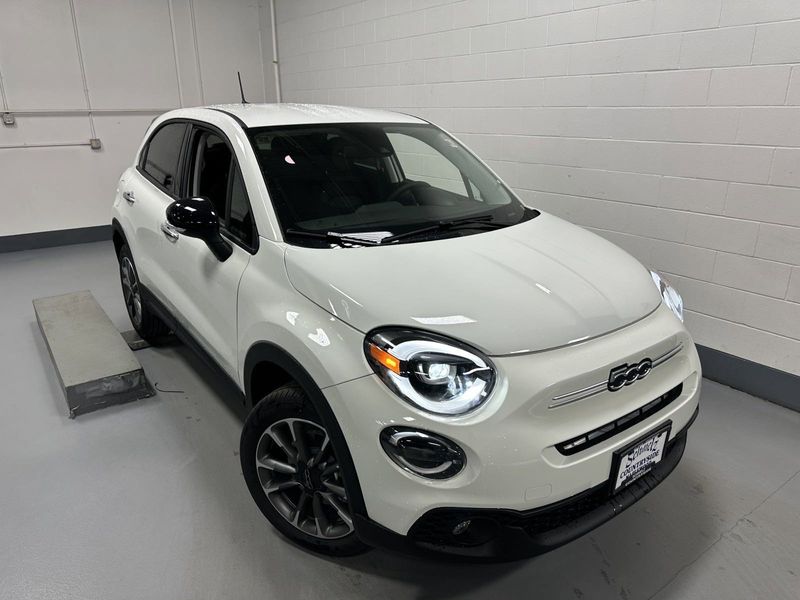 2023 Fiat 500x Pop Awd in a Bianco Gelato (White Clear Coat) exterior color and Blackinterior. Schmelz Countryside Alfa Romeo and Fiat (651) 968-0556 schmelzfiat.com 