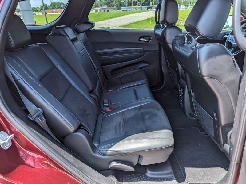 2021 Dodge Durango GT Plus in a Octane Red Pearl Coat exterior color and Blackinterior. Johnson Dodge 601-693-6343 pixelmotiondemo.com 