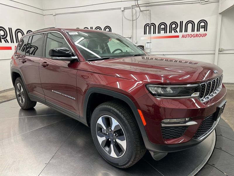 2024 Jeep Grand Cherokee 4xe in a Velvet Red Pearl Coat exterior color and Global Blackinterior. Marina Auto Group (855) 564-8688 marinaautogroup.com 