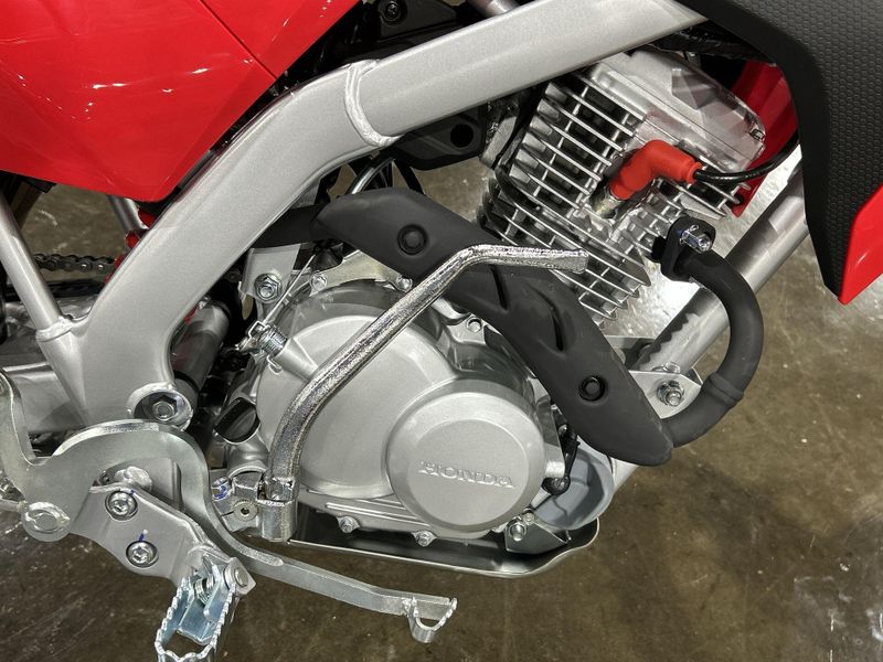 2025 Honda CRF125F BIG WHEEL  in a RED exterior color. Del Amo Motorsports of Redondo Beach (424) 390-7811 delamomotorsports.com 