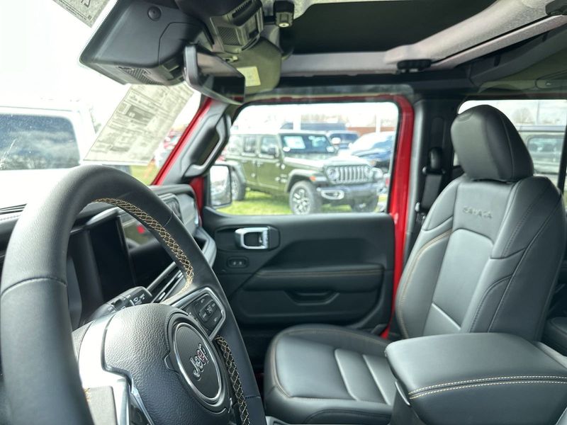 2024 Jeep Wrangler 4-door Sahara in a Firecracker Red Clear Coat exterior color. Gupton Motors Inc 615-384-2886 guptonmotors.com 