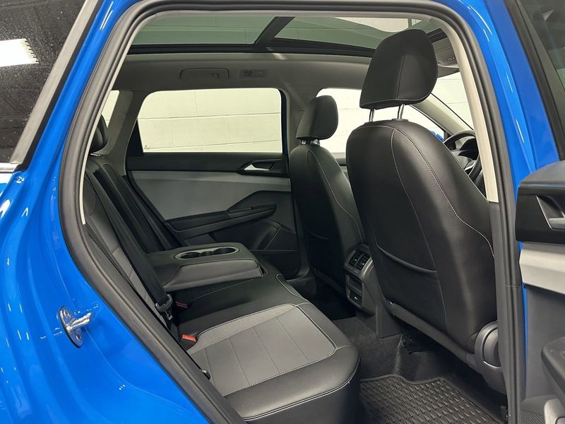 2023 Volkswagen Taos SE AWD w/Sunroof in a Cornflower Blue exterior color and Black Heated Seatsinterior. Schmelz Countryside Alfa Romeo and Fiat (651) 968-0556 schmelzfiat.com 