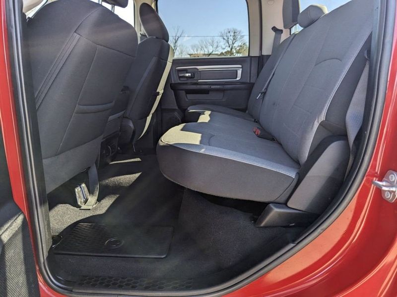 2021 RAM 1500 Classic SLT in a Flame Red Clear Coat exterior color and Diesel Gray/Blackinterior. Johnson Dodge 601-693-6343 pixelmotiondemo.com 
