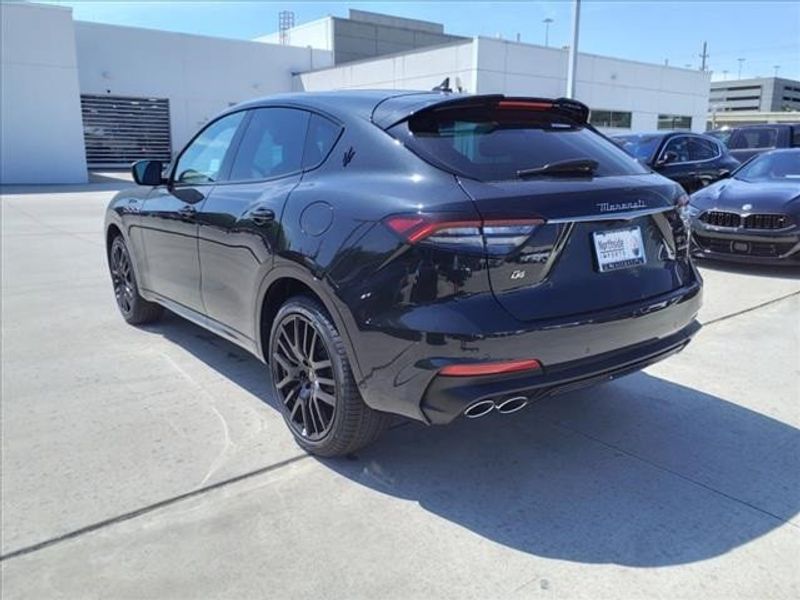 2024 Maserati Levante Modena in a Black exterior color and Black/Redinterior. Northside Imports Houston 281-475-4549 northsideimportshouston.com 