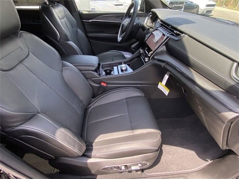 2023 Jeep Grand Cherokee Overland 4xe in a Diamond Black Crystal Pearl Coat exterior color and Global Blackinterior. McPeek