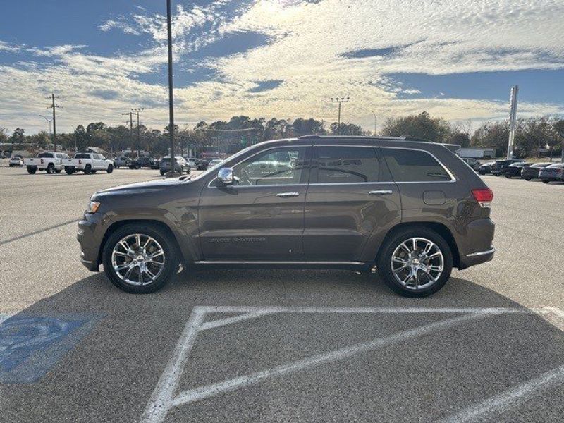 2017 Jeep Grand Cherokee Summit in a Walnut Brown Metallic Clear Coat exterior color and Browninterior. Randall Dodge Chrysler Jeep 877-790-6380 randalldodgechryslerjeep.com 