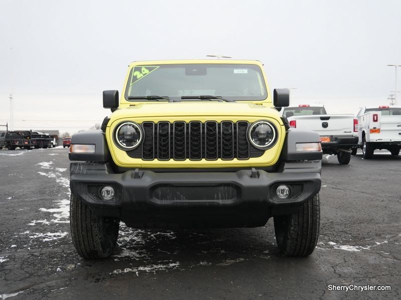 2024 Jeep Wrangler 4-door Sport S in a High Velocity Clear Coat exterior color and Blackinterior. Paul Sherry Chrysler Dodge Jeep RAM (937) 749-7061 sherrychrysler.net 