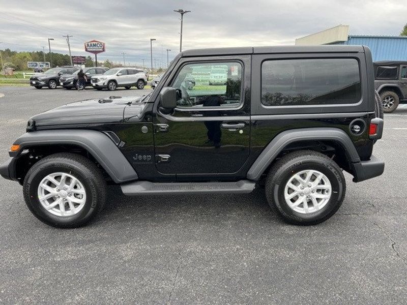 2023 Jeep Wrangler 2-door Sport S 4x4 in a Black Clear Coat exterior color and Blackinterior. Lakeshore CDJR Seaford 302-213-6058 lakeshorecdjr.com 