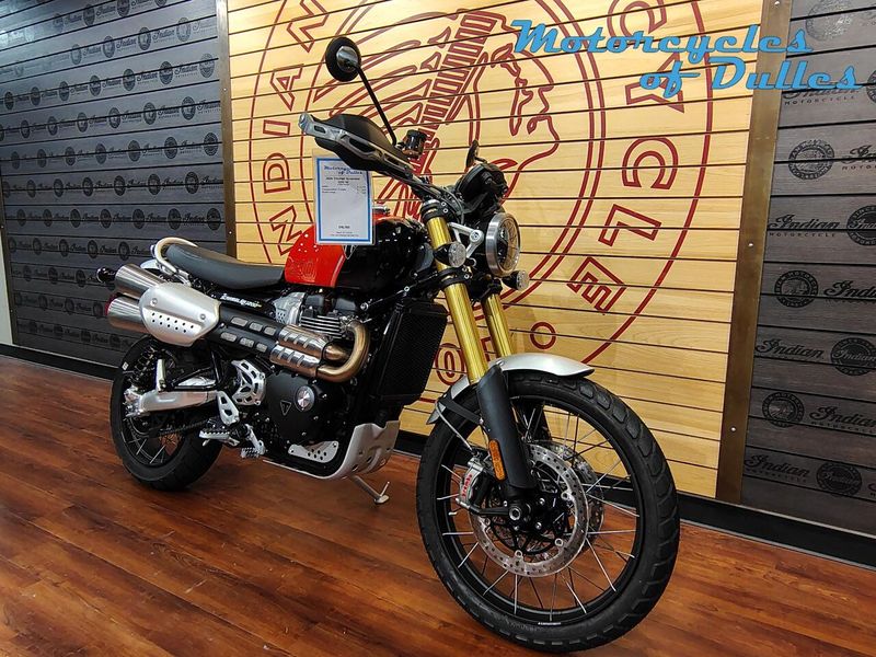 2024 Triumph Scrambler 1200 XE  in a Baja Orange/Phantom Black exterior color. Motorcycles of Dulles 571.934.4450 motorcyclesofdulles.com 