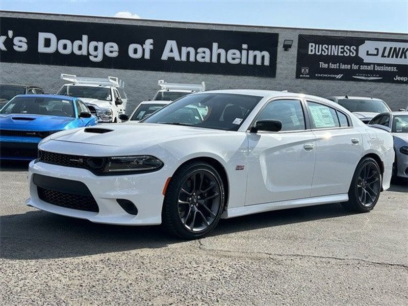 2023 Dodge Charger Scat Pack in a White Knuckle exterior color and Blackinterior. McPeek