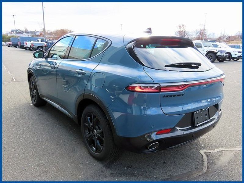 2024 Dodge Hornet R/T Plus in a Blue Steele exterior color and Blackinterior. Papas Jeep Ram In New Britain, CT 860-356-0523 papasjeepram.com 