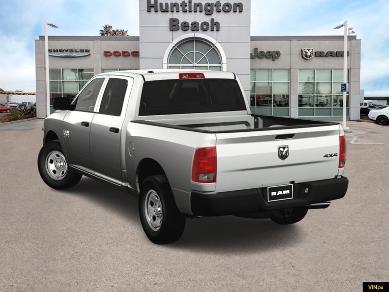 2023 RAM 1500 Classic Tradesman Crew Cab 4x4 in a Bright White exterior color and Blackinterior. BEACH BLVD OF CARS beachblvdofcars.com 