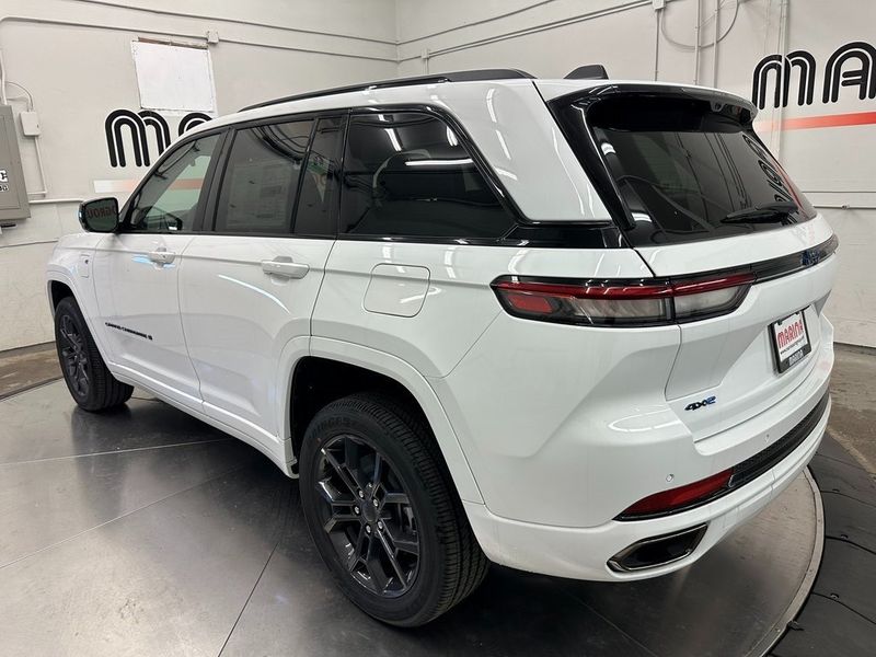 2024 Jeep Grand Cherokee Anniversary Edition 4xe in a Bright White Clear Coat exterior color and Global Blackinterior. Marina Auto Group (855) 564-8688 marinaautogroup.com 